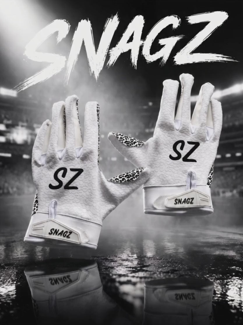Snagz gloves floating in a stadium